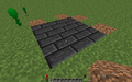 Step 1:The dirt blocks are shown as reference for the size of the 3x3 base of Seared Bricks